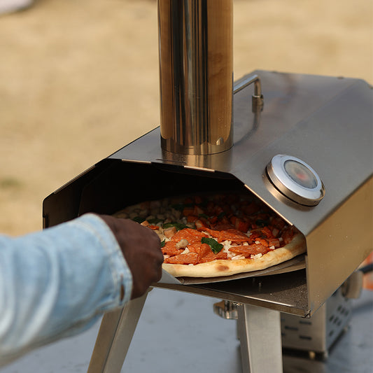 QubeStove self rotating pizza oven and outdoor stove